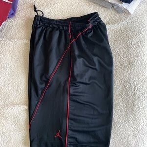 Nike Jordan men’s basketball shorts. Black with red piping, sharp!!!